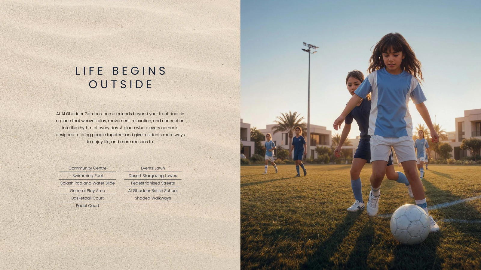 Football and sports courts viewed across Al Ghadeer open space