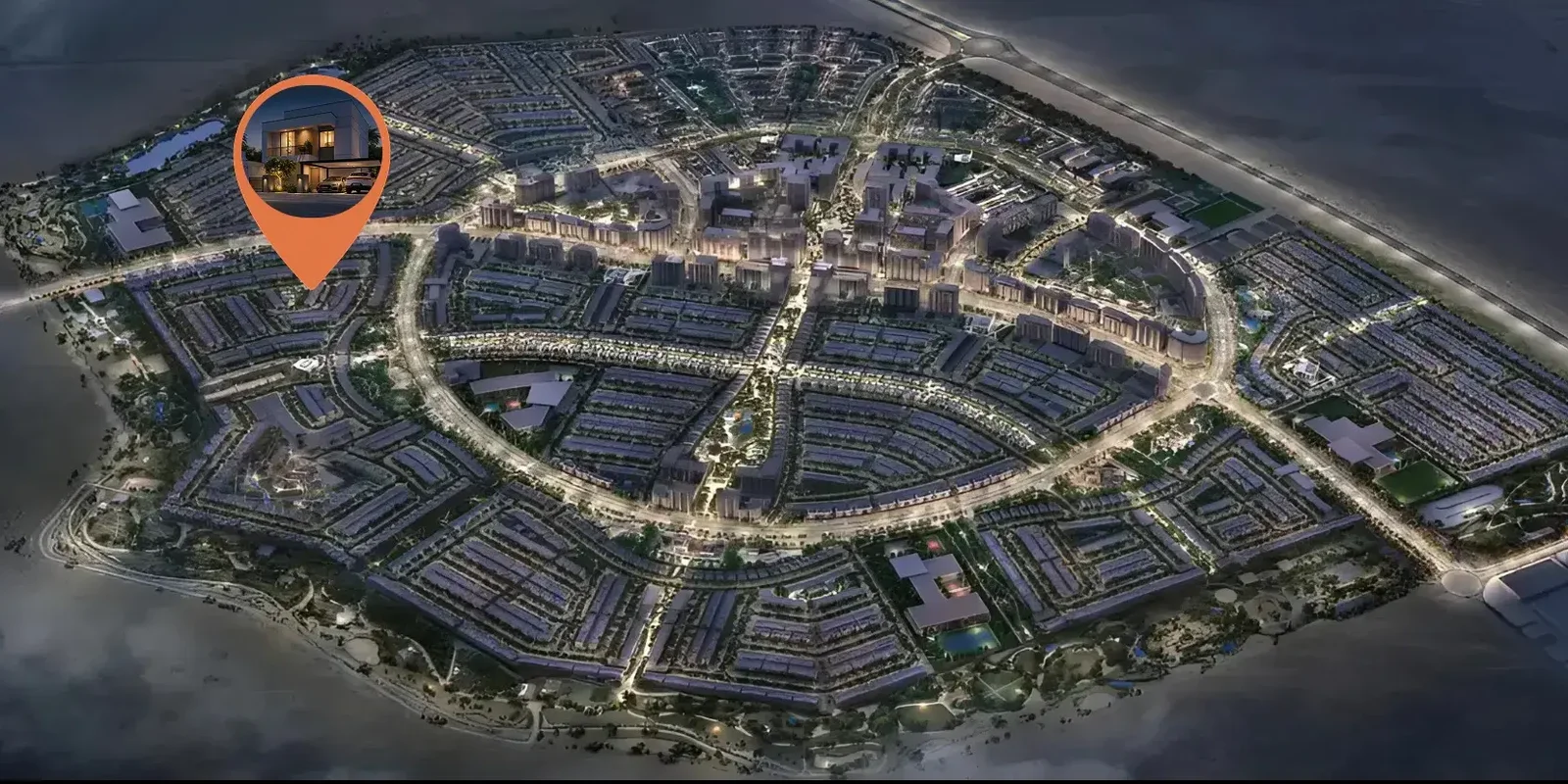 Night aerial of Al Ghadeer Gardens streets with a location pin over the masterplan